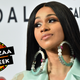 Cardi B at Tidal X: Brooklyn at Barclays Center of Brooklyn on Oct. 17, 2017, in New York City (Mike Coppola/Getty Images for Tidal); photo illustration by GMG/The Root